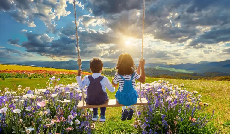 Children swinging on swing